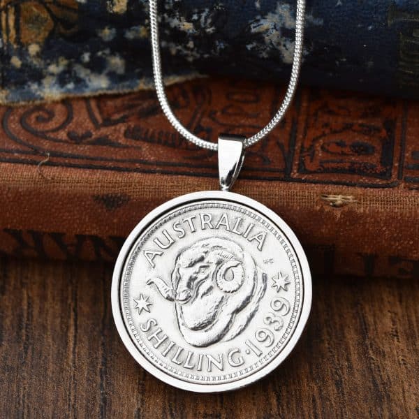 1939 Australian shilling with ram's head design in a polished silver bezel pendant on a silver chain