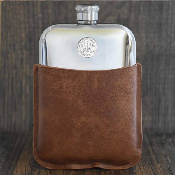 Polished pewter hip flask in a tan brown leather sleeve, 1943 Australian threepence with wheat ears set into the front