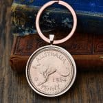 1964 Australian penny with kangaroo reverse in a rose gold bezel on a rose gold split-ring keyring
