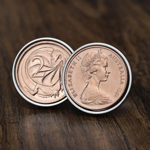 1984 Australian two cent cufflinks, copper coins in silver-tone bezels, Queen and frilled-neck lizard