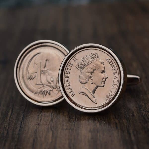 1987 Australian one cent cufflinks, bronze coins in silver-tone bezels, crowned Queen portrait and glider