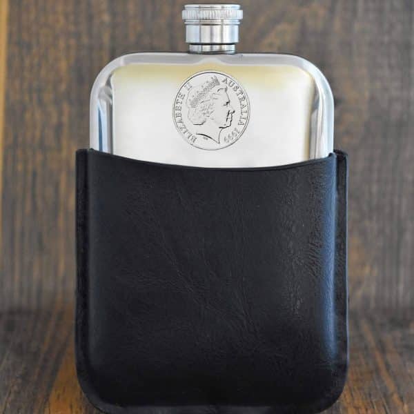 1999 Australian 20 cent coin set into the front of a polished pewter hip flask in a black leather sleeve