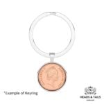 1987 Australian coin showing Elizabeth II facing right, set in a silver bezel keyring