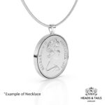 Angled view of a 1977 Australian coin with Elizabeth II portrait in a silver bezel pendant on a snake chain