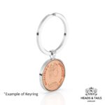 1966 Australian coin with young Elizabeth II portrait in a silver bezel keyring, angled side view