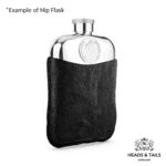 Polished hip flask in a black leather sleeve, 1977 Australian fifty cent on the front