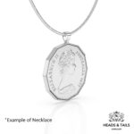 Angled view of a 1977 twelve-sided Australian 50c coin in a silver bezel pendant on a snake chain