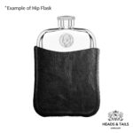 Front of a pewter hip flask with a 2000 US Jefferson nickel set in, black leather sleeve below