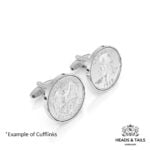 Pair of silver cufflinks set with US quarters, one showing the 1967 Washington head, the other the eagle
