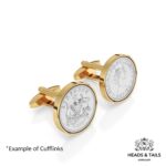 Pair of gold cufflinks set with 1957 Australian sixpences, coat of arms and Queen's head sides shown