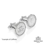 Pair of silver cufflinks set with 1957 Australian sixpences, one coat of arms side and one Queen's head