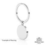 Plain reverse of a round silver bezel keyring on a split ring, white background, example of the keyring