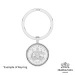 1957 Australian sixpence keyring in a silver bezel, coat of arms with kangaroo and emu facing forward
