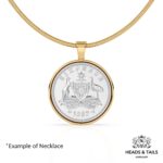 1957 Australian sixpence, kangaroo and emu coat of arms, in a gold bezel on a gold snake chain
